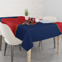 Custom rectangular tablecloth in red and navy with yellow trim along the border