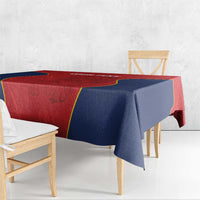 Custom tablecloth side view with red front edge and navy drape over the table