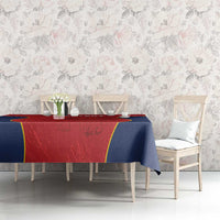 Custom tablecloth draped on long table: red panel, navy sides, yellow border