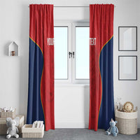 Red window curtains with navy accents and yellow curved trim, styled on both sides of a door