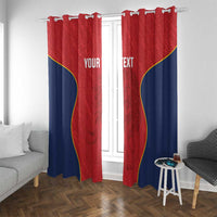 Window curtains in red and navy with yellow curved trim, mounted with pole grommets or rings