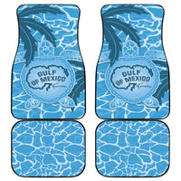 Set of blue car mats with Gulf of Mexico turtle logo on ocean wave design