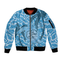 Blue unisex bomber jacket with full-zip front, turtle graphic, black ribbed cuffs