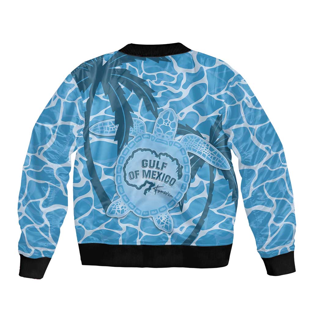 Blue unisex bomber jacket, back turtle logo, black ribbed hem and cuffs