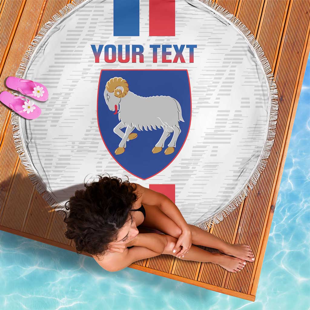 Round beach blanket featuring Faroe crest, blue-white-red flag bars, and fringe
