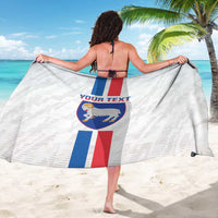 White football sarong worn as wrap with back view showing shield and striped design
