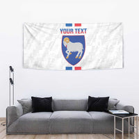 White football tapestry with Faroe Islands crest and 'YOUR TEXT' above blue/red stripes.