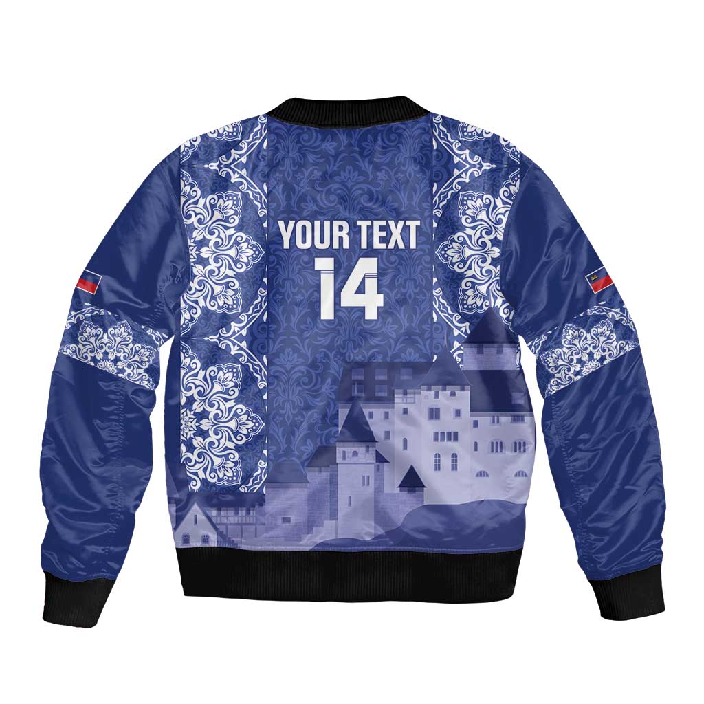 Blue bomber jacket back with white ornaments, castle graphic, and "YOUR TEXT" 14