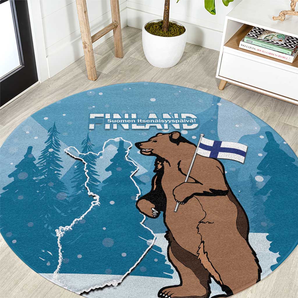 Round blue area rug with bear holding Finland flag and map design