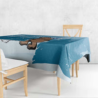 Blue tablecloth corner detail with bear silhouette and Finland map graphic