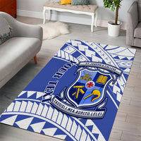 Blue patterned area rug with school crest and zigzag border, wide view