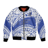 Blue and white patterned bomber jacket with zip front and black ribbed cuffs
