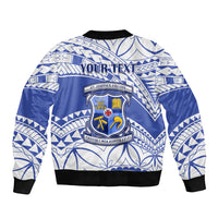Blue and white patterned bomber jacket with crest graphic and zip front, black ribbed hem
