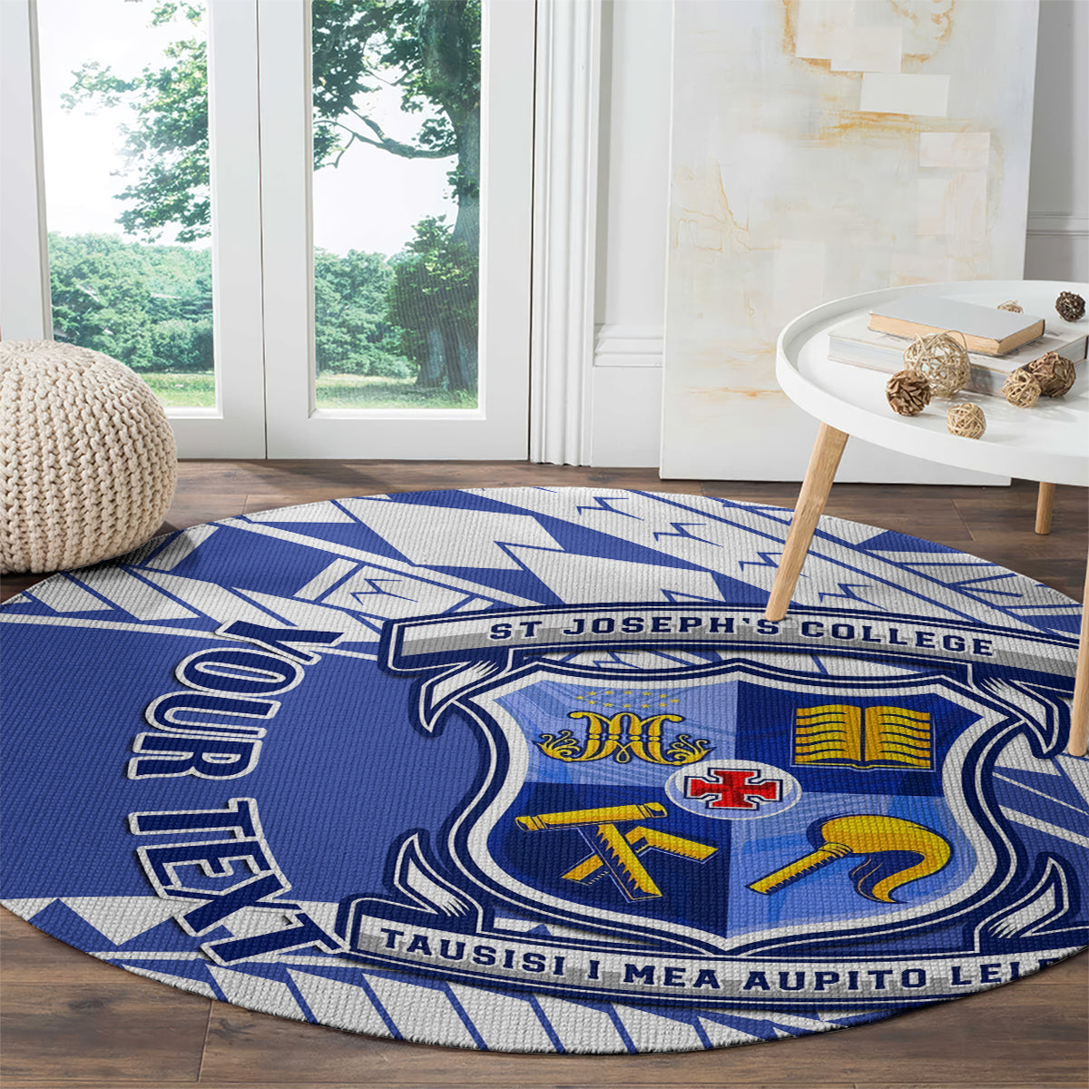Round blue patterned carpet rug with crest and 'ST JOSEPH'S COLLEGE' lettering