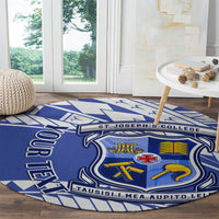 Round blue patterned carpet rug with crest and 'ST JOSEPH'S COLLEGE' lettering