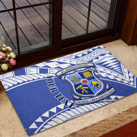 Blue rubber doormat with school crest and “YOUR TEXT” on a white tribal pattern.