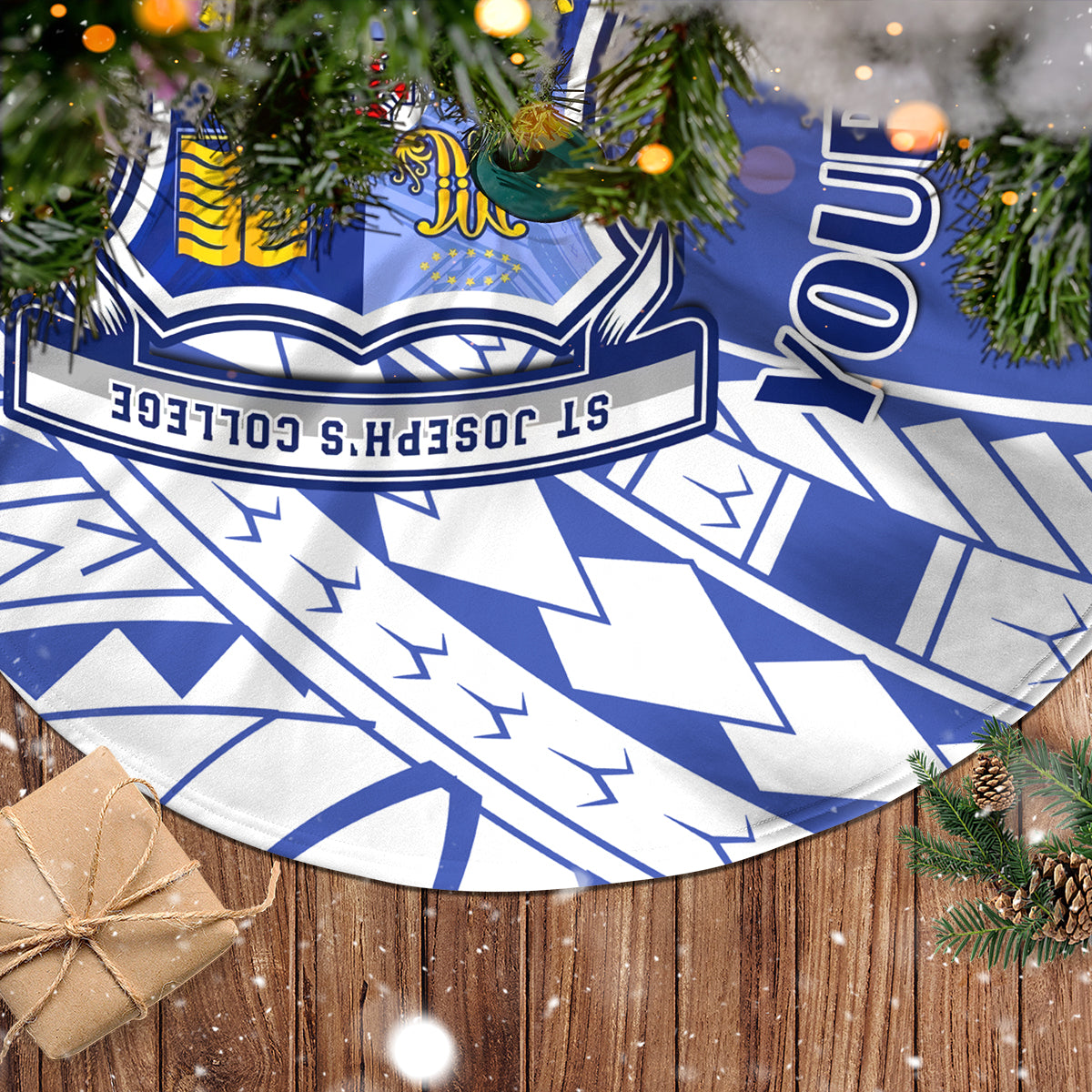 Blue and white patterned tree skirt with crest emblem and geometric shapes, circular