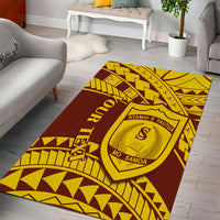 Samoa patterned area rug, red center with gold tribal shapes and circular crest