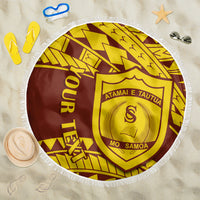 Round beach blanket with fringe edge, Samoa crest and gold-and-maroon geometric pattern