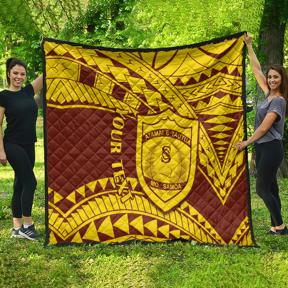 Large gold and maroon patterned quilt with shield crest and ORRITUA lettering