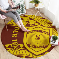 Round maroon-and-yellow Samoan patterned carpet with shield emblem and MO SAMOA text