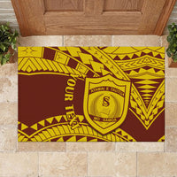 Brown and gold Samoan patterned rubber doormat with shield crest and Our Tek text