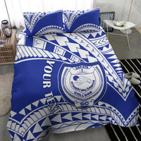Blue bedding set with SAFATA College logo and tribal geometric motifs
