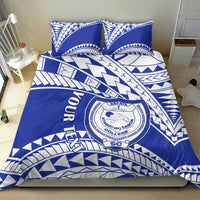 Blue and white bedding set with SAFATA College crest and zigzag geometric pattern