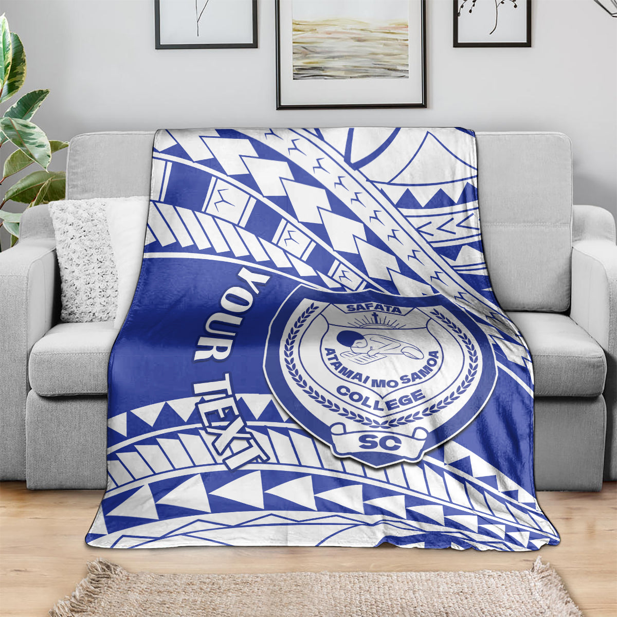 Blue and white geometric college blanket featuring a circular crest emblem