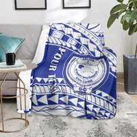 Blue and white patterned college blanket with circular crest and bold vertical text