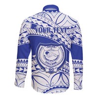 Blue long-sleeve button shirt with back crest and tribal pattern