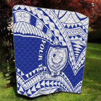 Blue and white Samoan pattern quilt with crest logo and diagonal geometric bands