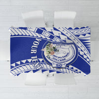 Blue and white Samoa-inspired patterned tablecloth with school crest and logo