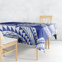 Blue and white Samoan geometric patterned tablecloth draped over a table