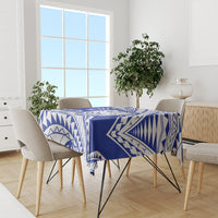 Blue and white Samoan patterned tablecloth on dining table with chairs