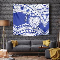 Blue and white patterned college tapestry with circular crest and Samoan-style motifs