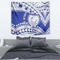 Blue college tapestry featuring a round crest and bold white geometric Samoan-style designs
