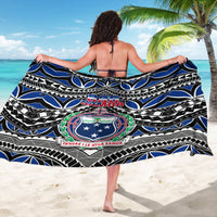 Samoa 685 sarong draped with blue, black, and white tribal design and crest
