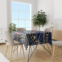 Blue and black tablecloth on dining table with tribal motifs and Samoa crest