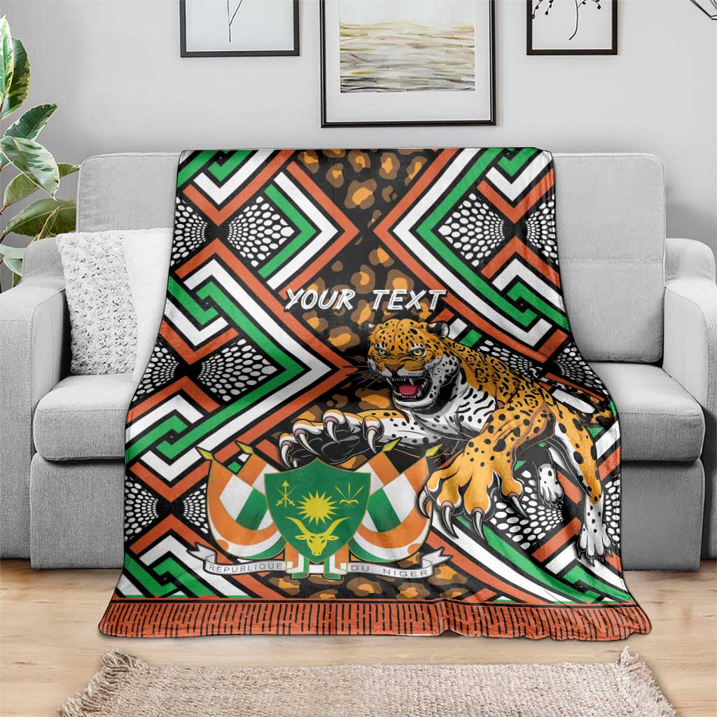 Leopard and Niger-themed patterned throw blanket with "YOUR TEXT" across the center