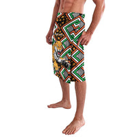 African patterned wrap skirt with leopard face center panel and multicolor geometric border