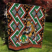 Leopard-themed personalized quilt blanket with green and orange geometric border and black base