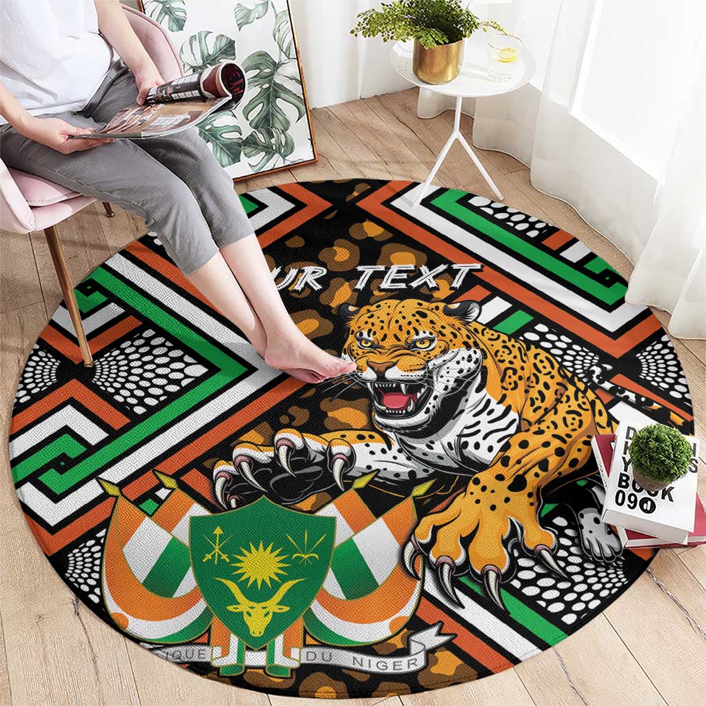 Personalized round rug with leopard face and bold green orange African geometric design