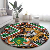 Round black patterned carpet with leopard illustration and tribal geometric motifs in green