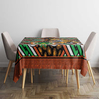 Leopard-themed African geometric tablecloth in green, orange, black, and white