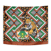 Close-up personalized tapestry: leopard, 'Your Text', and bold green/orange geometric pattern