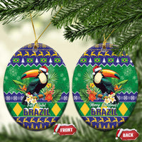 Oval ceramic Christmas ornament with toucan and Brazil holiday pattern, gold hanging cord