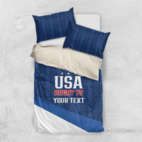 Blue and white duvet cover with USA Rugby 7s print and two blue accent pillows