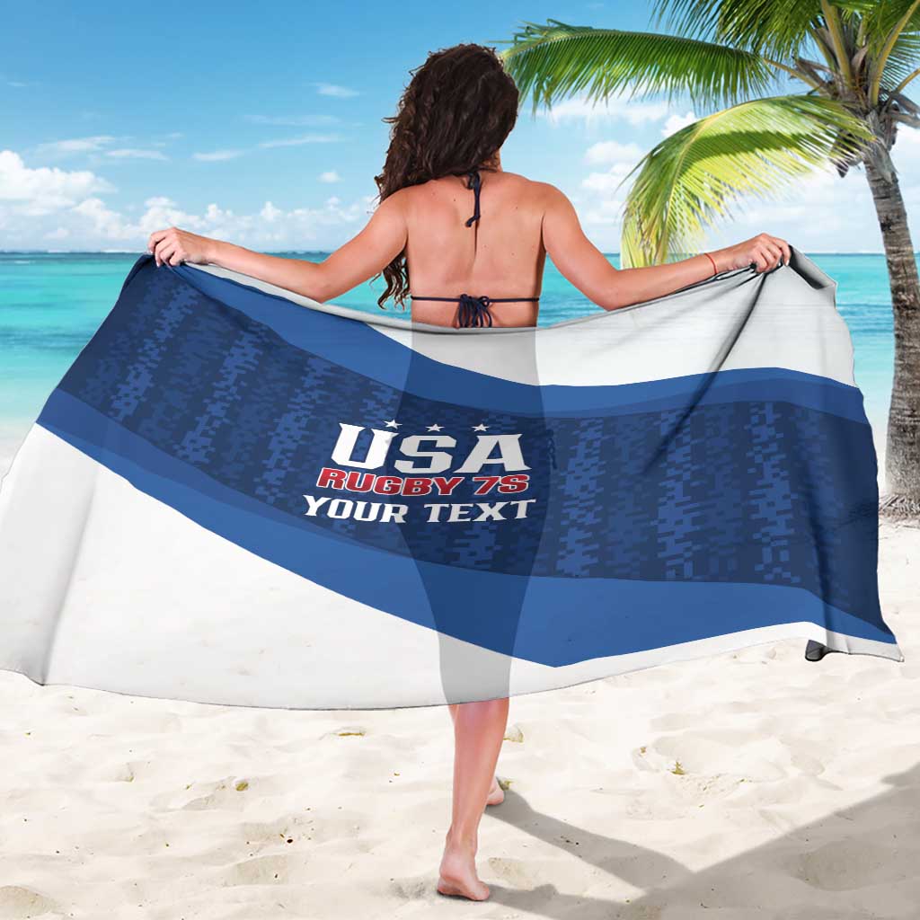 Blue and white diagonal stripe sarong towel with USA Rugby 7s graphic, back view