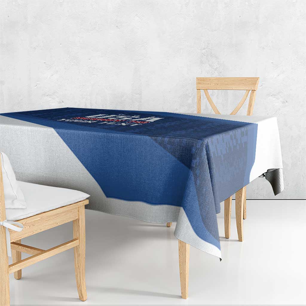 Blue custom rugby tablecloth with diagonal USA Rugby 7s banner on table with drape